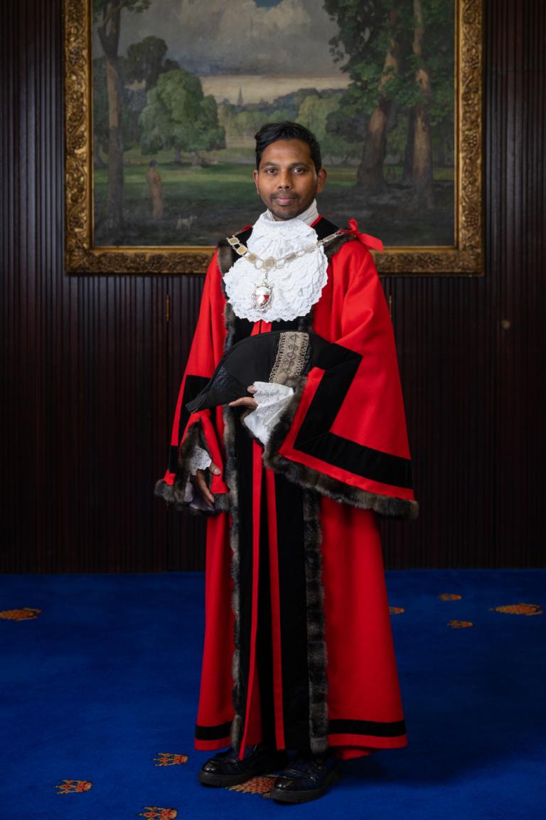 Deputy Mayor Aarien Areti dressed in his ceremonial robes